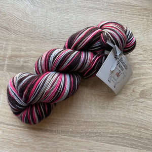 DESTASH - Nomadic Yarns Twisty Sock Self Striping Yarn pink, brown, and grey